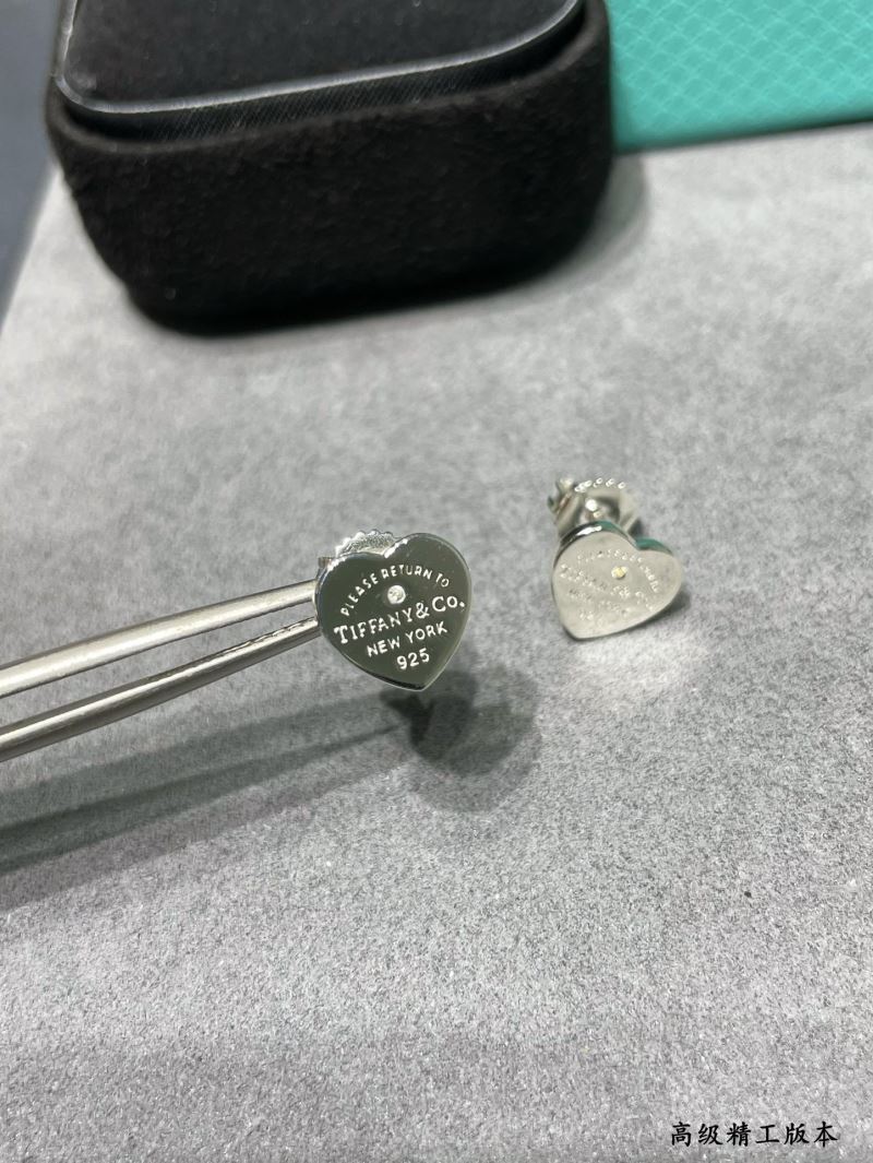 T*f*ny earrings